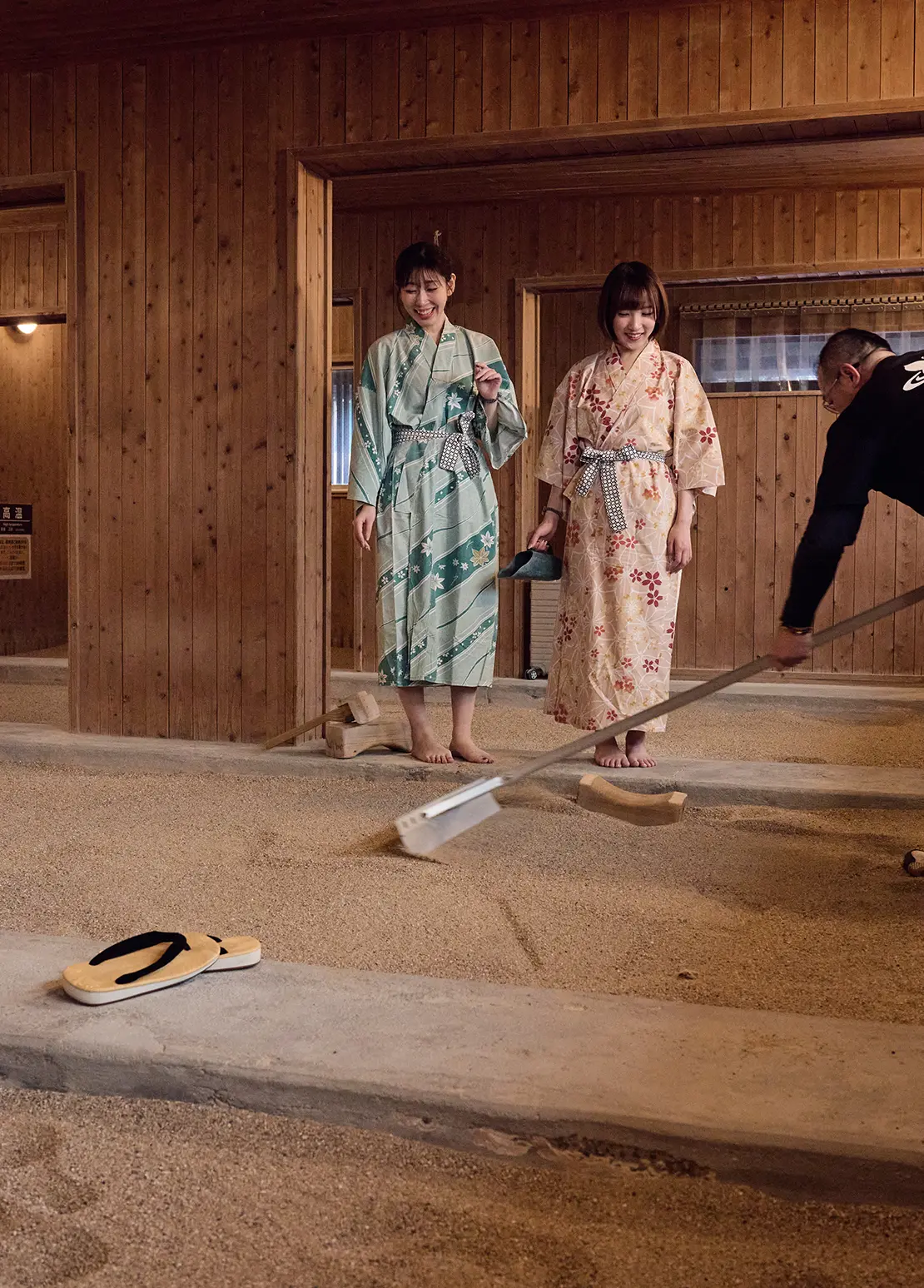 Man cleaning a traditional bathhouse – insight into Japan’s onsen culture
