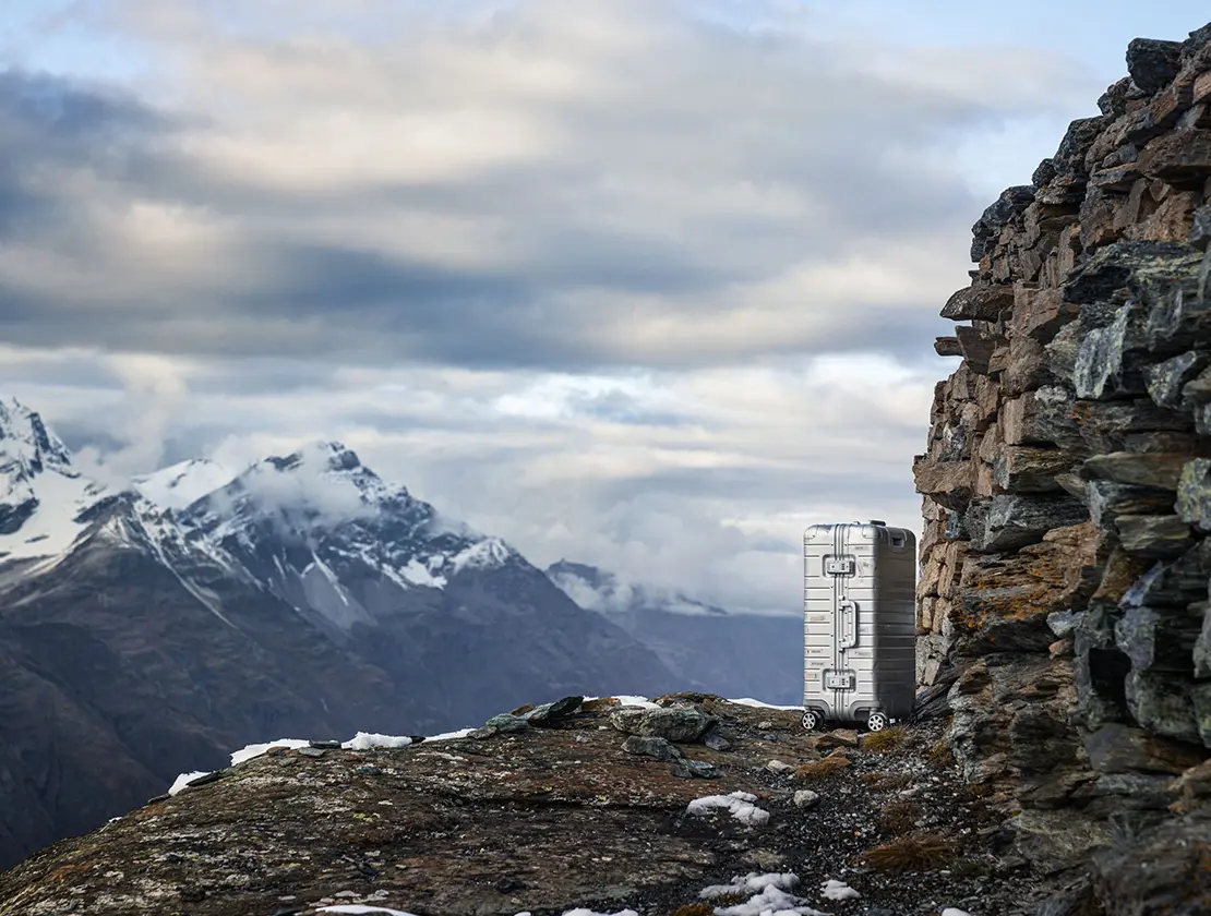 Suitcase in mountains