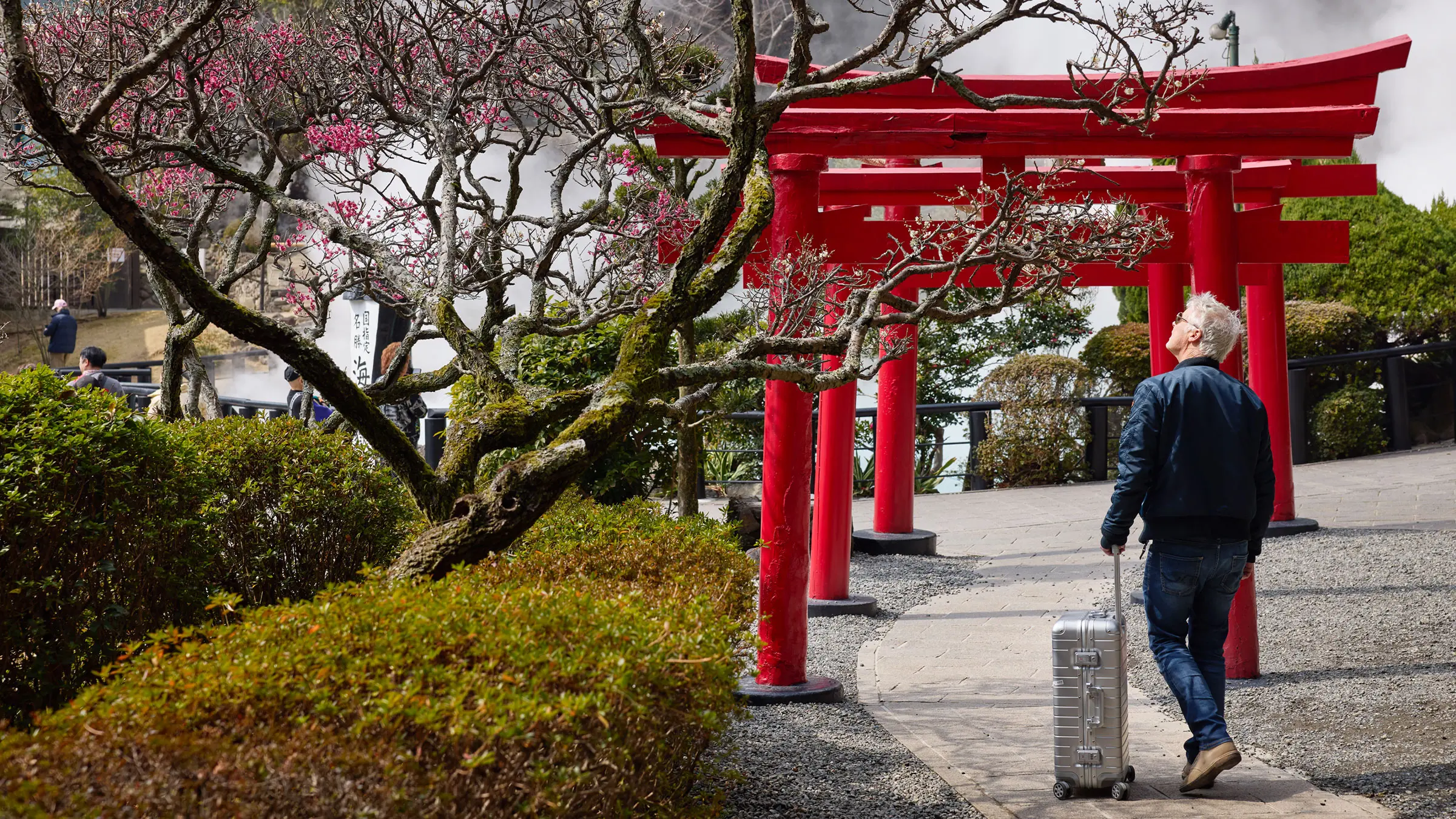 Red torii in a garden in Beppu – spiritual site and must-see in Japan