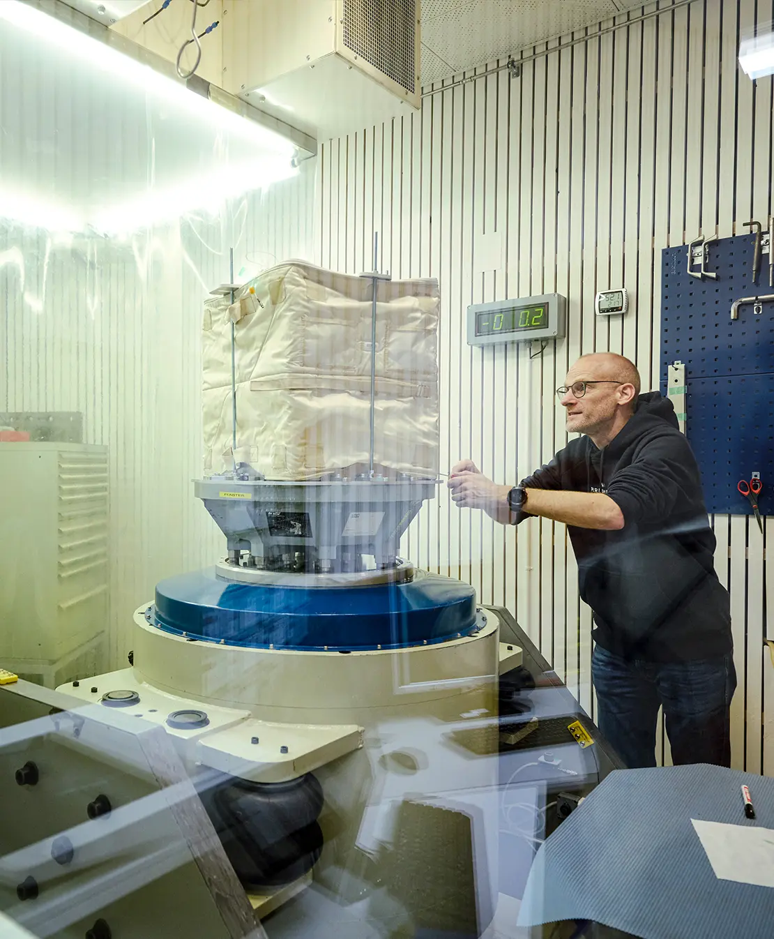 Person working on a machine