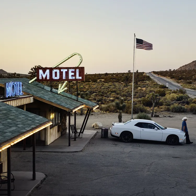 Car in front of motel