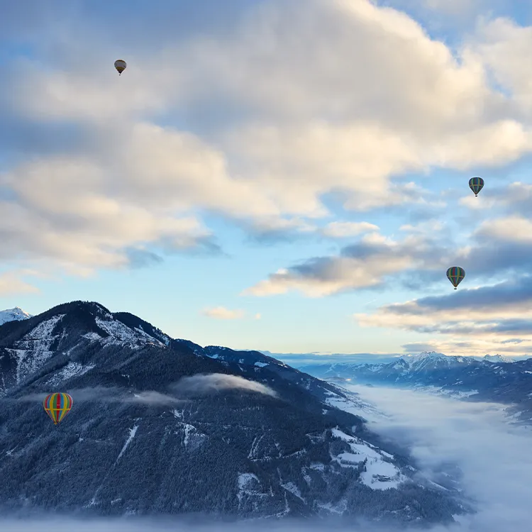 Balloons floating over the Alps